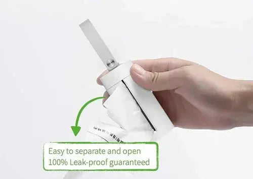 Hand holding a white, leak-proof portable pet waste bag dispenser with easy open feature